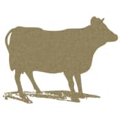 A golden silhouette of a cow